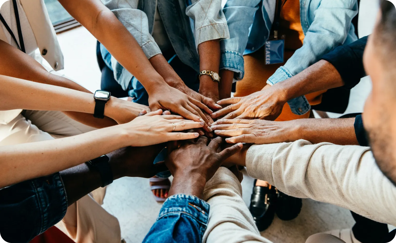 Diverse hands joined in unity